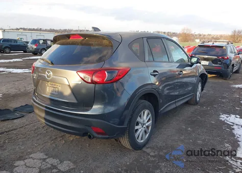 2013 Mazda Cx-5 Touring z USA, uszkodzony, nr VIN JM3KE4CE5D0126831